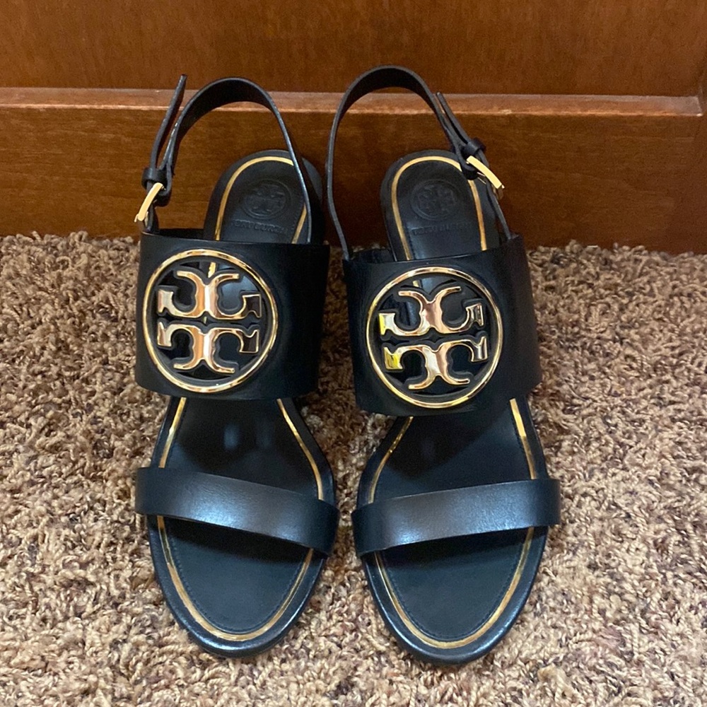 The Tori Burch city sandal in black size 8 1/2… Brand new never been worn